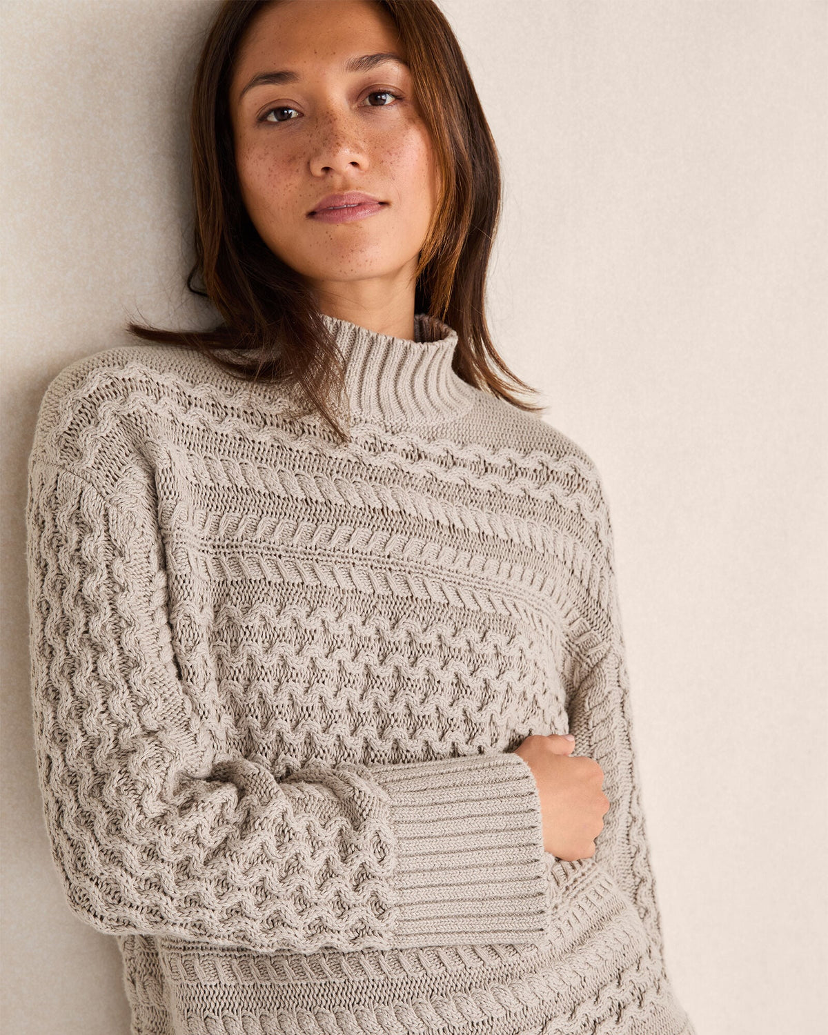 ORGANIC COTTON CABLE KNIT FUNNEL NECK SWEATER