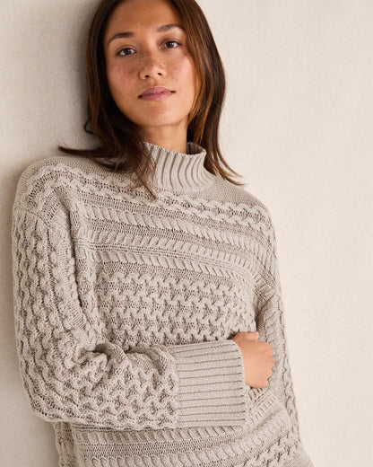 ORGANIC COTTON CABLE KNIT FUNNEL NECK SWEATER