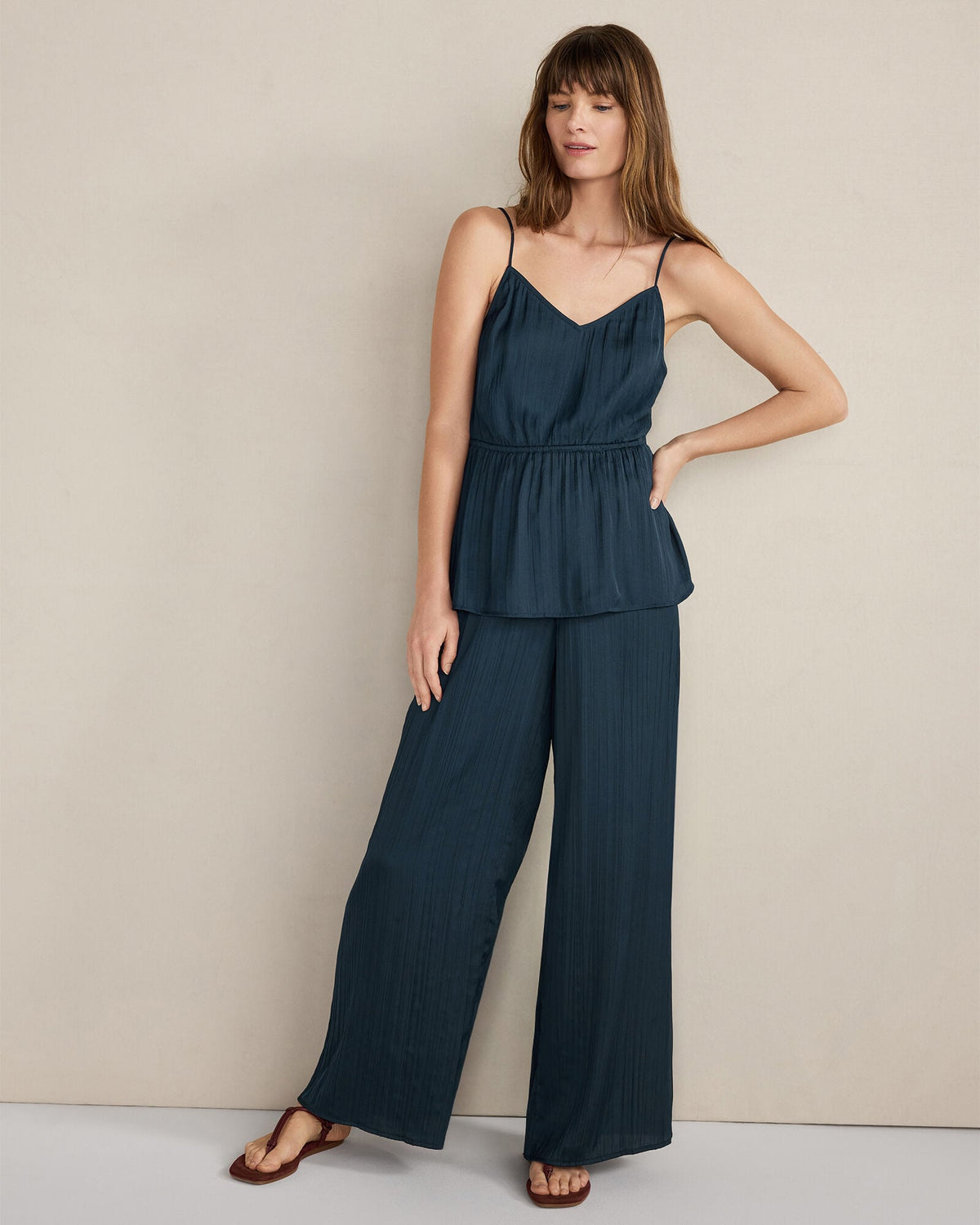 SILKY PLEATED PEPLUM TOP