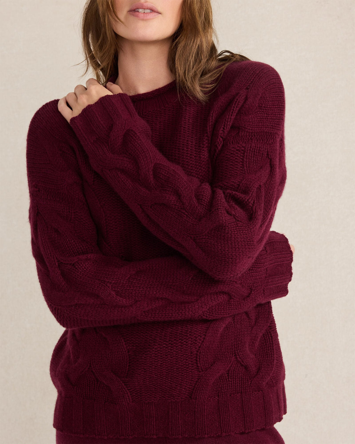 CASHMERE CABLE ROLL NECK SWEATER