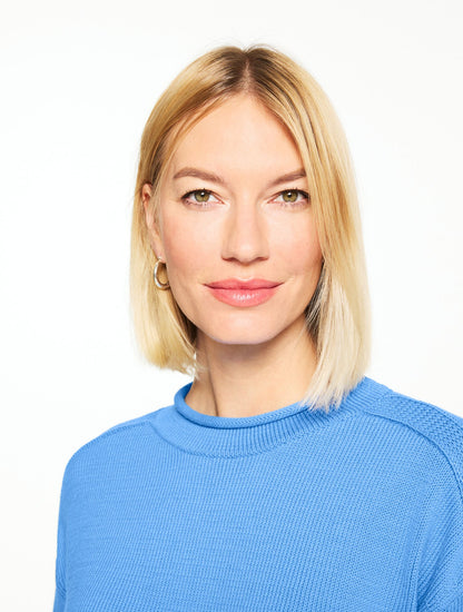 THE CLASSIC ROLL NECK SWEATER