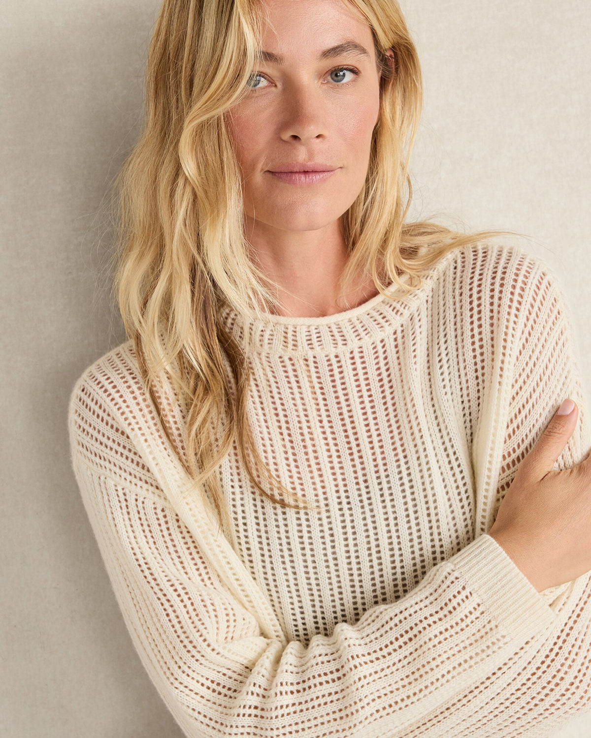 WOOL AND CASHMERE POINTELLE ROLL NECK SWEATER