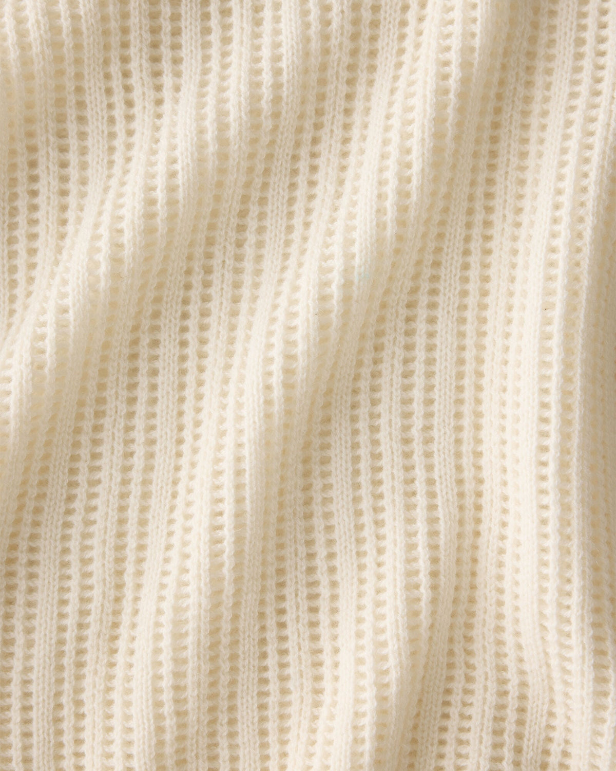 WOOL AND CASHMERE POINTELLE ROLL NECK SWEATER